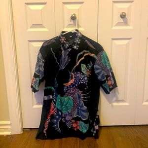 Nice short sleeve button from Brunei.